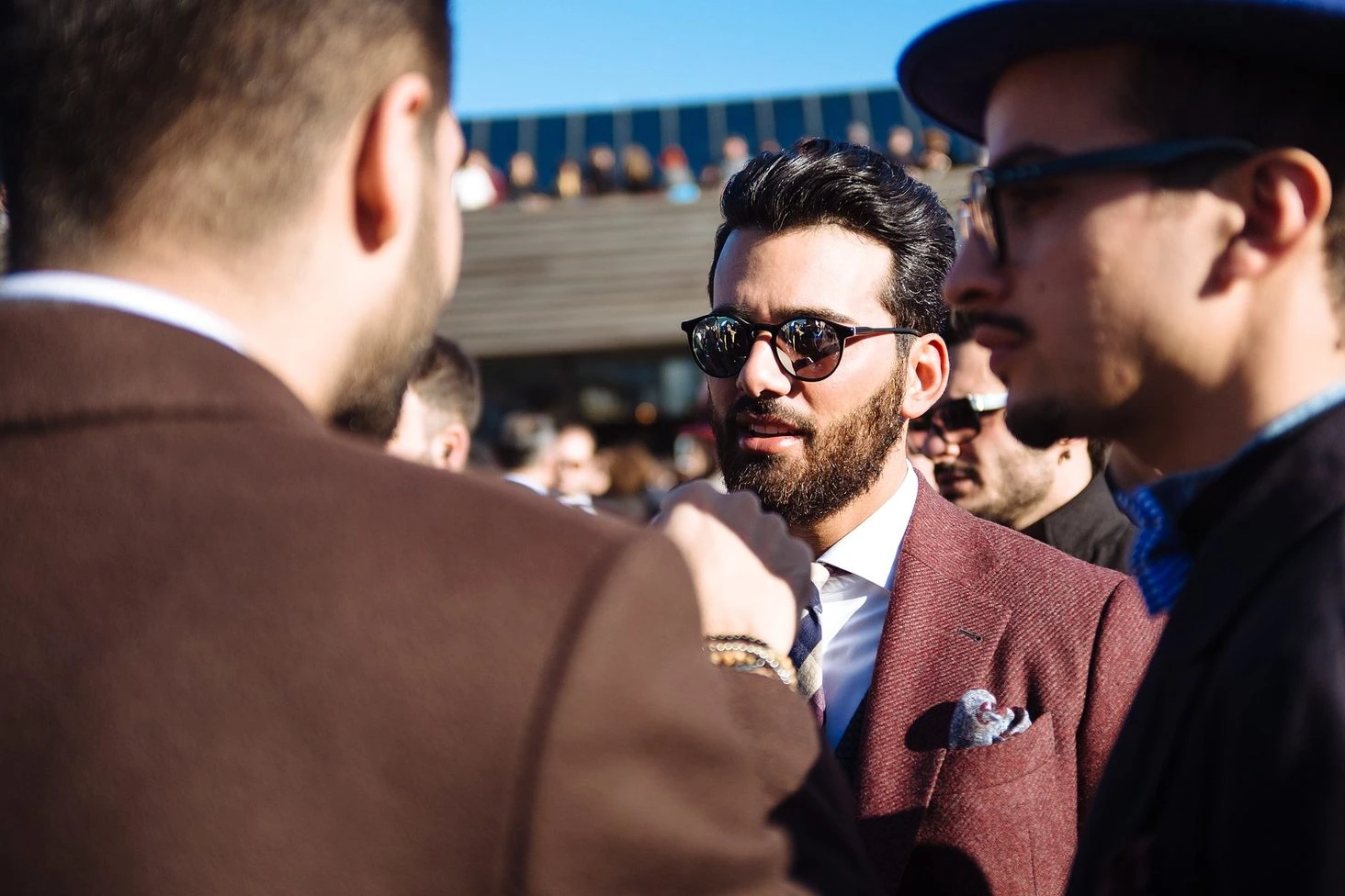 Pitti Uomo 89 Florence menswear street style portrait Fujifilm: single-breasted grey suit with paisley tie, shot 18