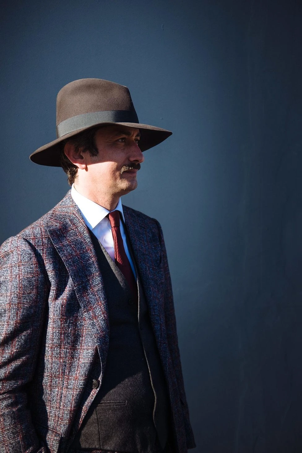 Pitti Uomo 89 Florence menswear street style portrait Fujifilm: loden coat with alpine hat and knit tie, shot 31