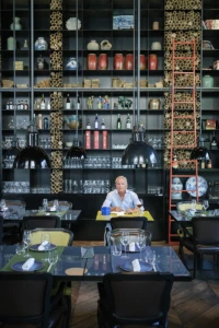 Wide view of the man in the Conservatorium Hotel restaurant in Amsterdam, YVRA perfume shoot