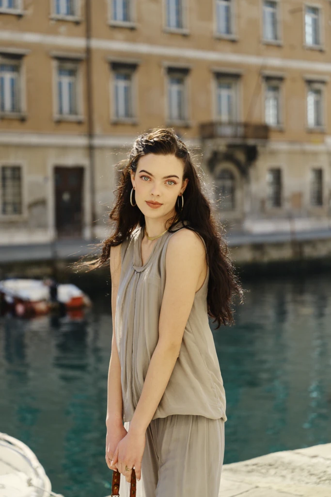 Filippa model portrait walking through central Trieste -- fashion campaign photography in Trieste