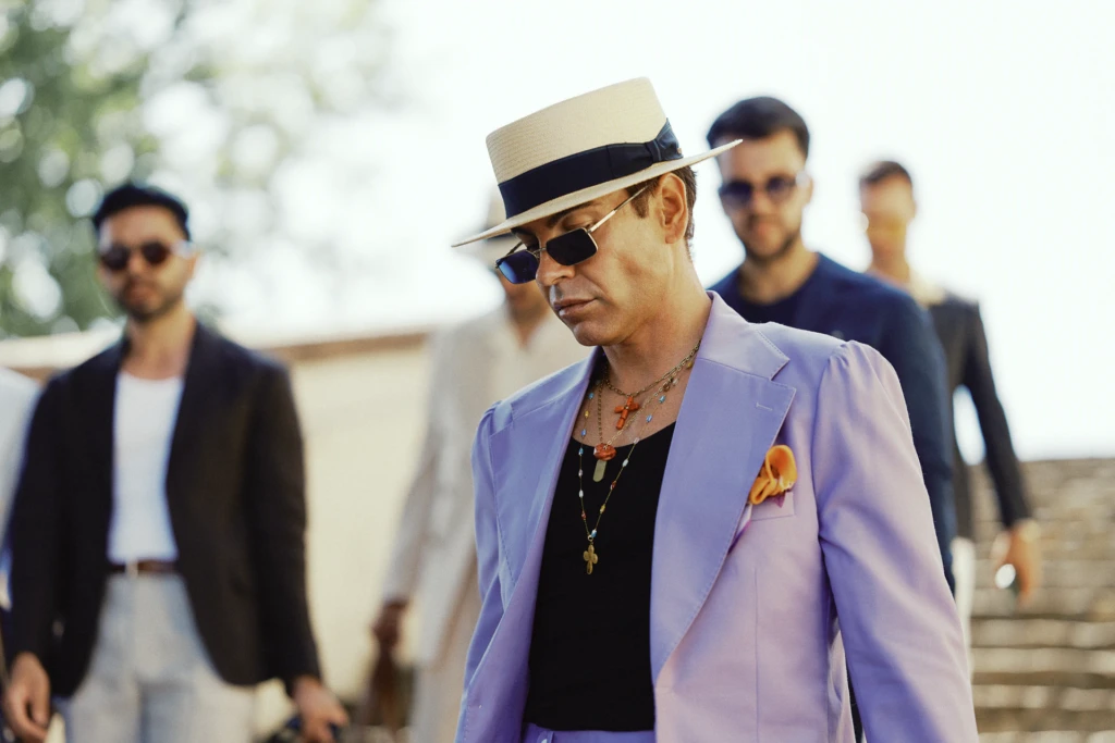 Attendee style at the Pitti Immagine Uomo 108 fairgrounds in Florence.