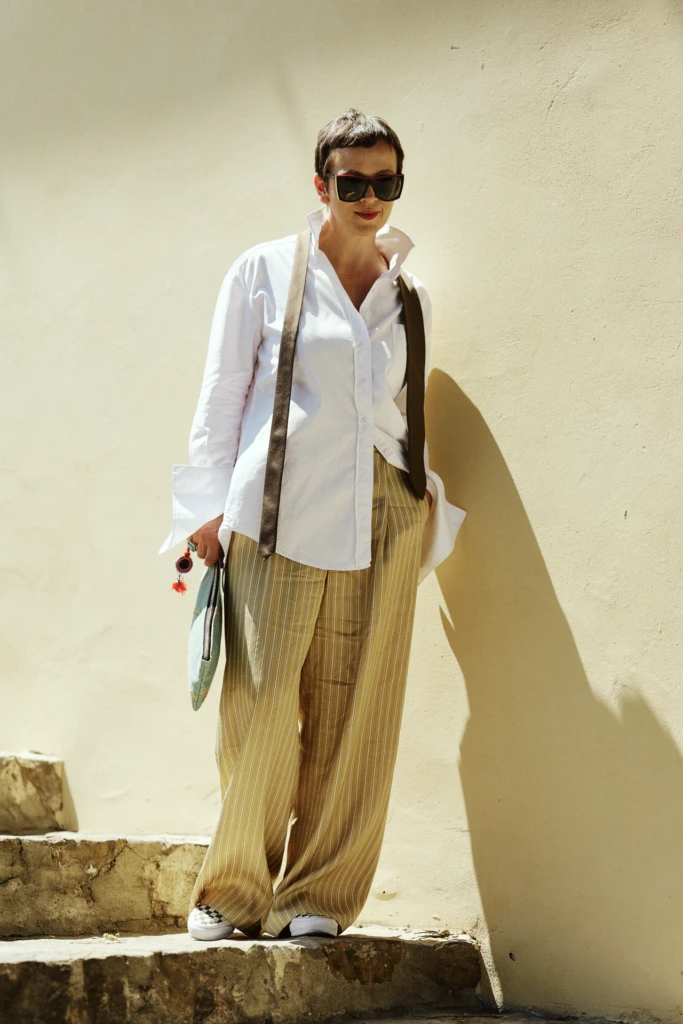 Attendee style at the Pitti Immagine Uomo 108 fairgrounds in Florence.