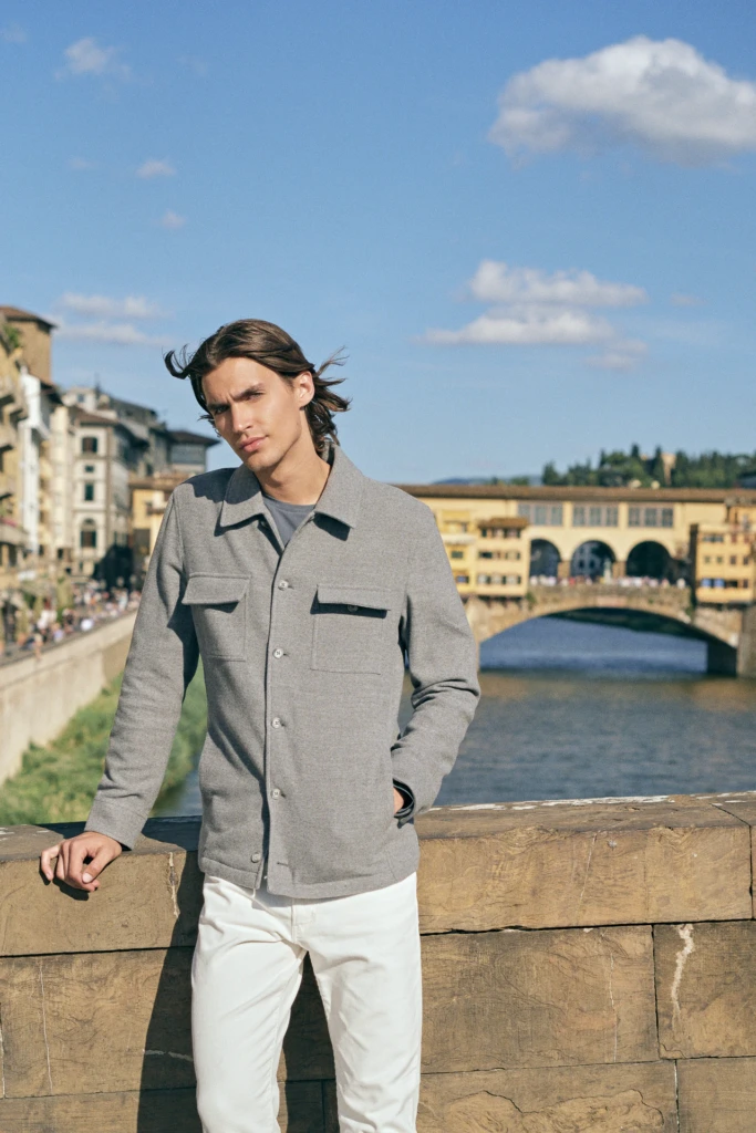 Patrick Assaraf campaign portrait against classic Florentine architecture -- fashion campaign photography by Alessandro Michelazzi