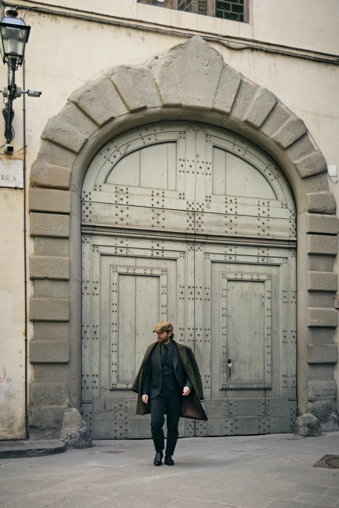 Hockerty menswear editorial photographed by Alessandro Michelazzi at Pitti Immagine Uomo 107 in the streets and pavilions of Florence, look 053.