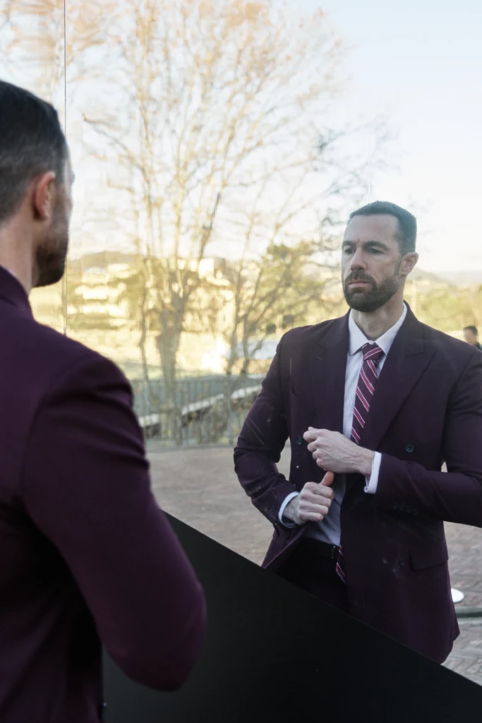 Hockerty menswear editorial photographed by Alessandro Michelazzi at Pitti Immagine Uomo 107 in the streets and pavilions of Florence, look 061.