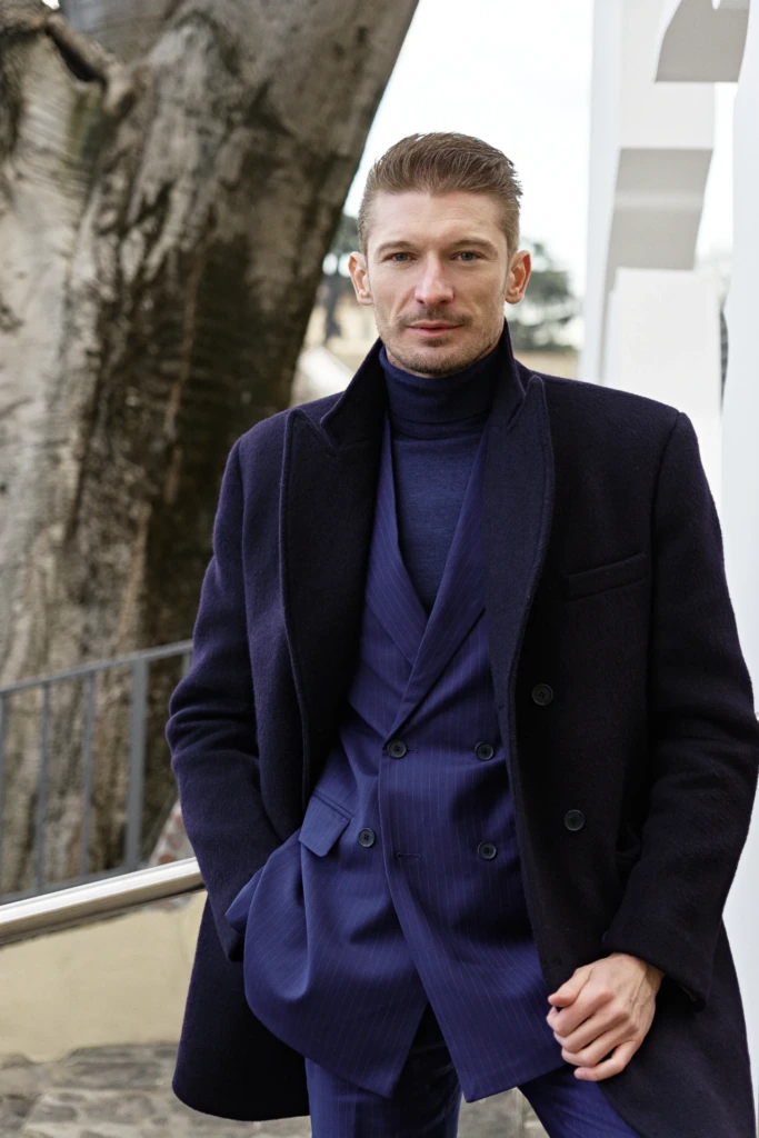 Hockerty menswear editorial photographed by Alessandro Michelazzi at Pitti Immagine Uomo 107 in the streets and pavilions of Florence, look 066.