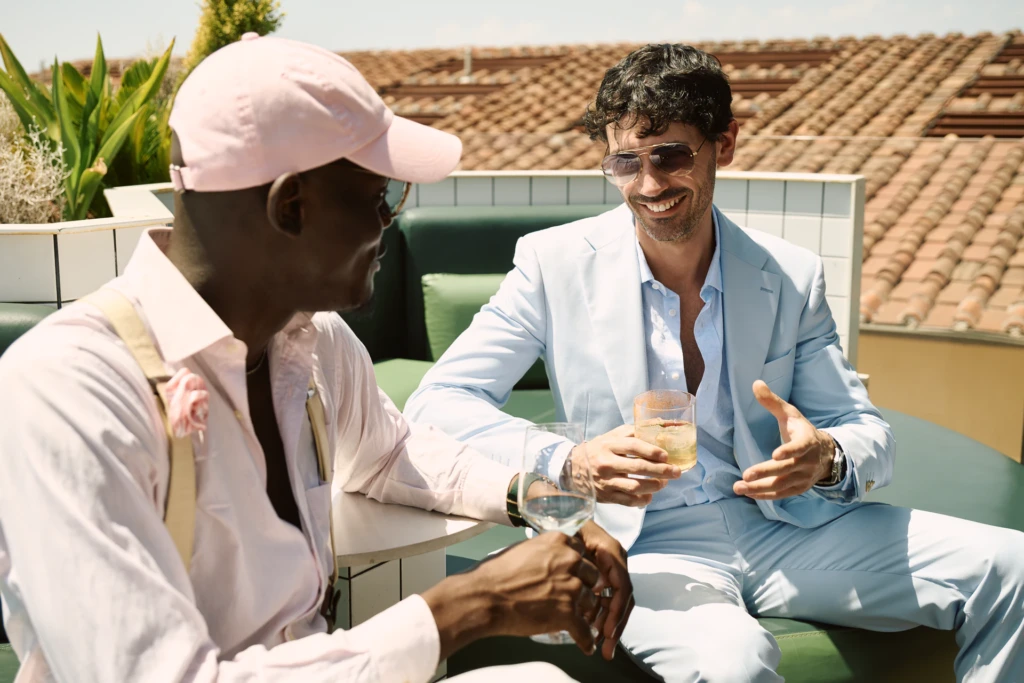 Hockerty Summer Lookbook rooftop party at the Student Hotel Florence, with the Duomo in view.