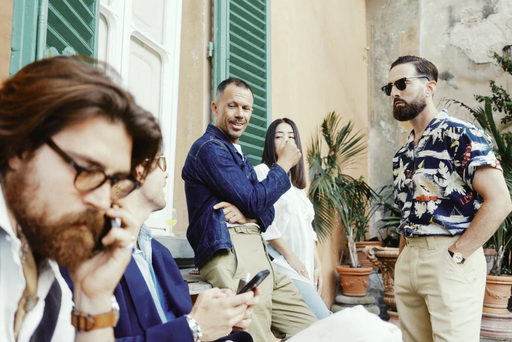 Guests at the Plaza Uomo summer party in the garden of Palazzo Budini Gattai, Florence.