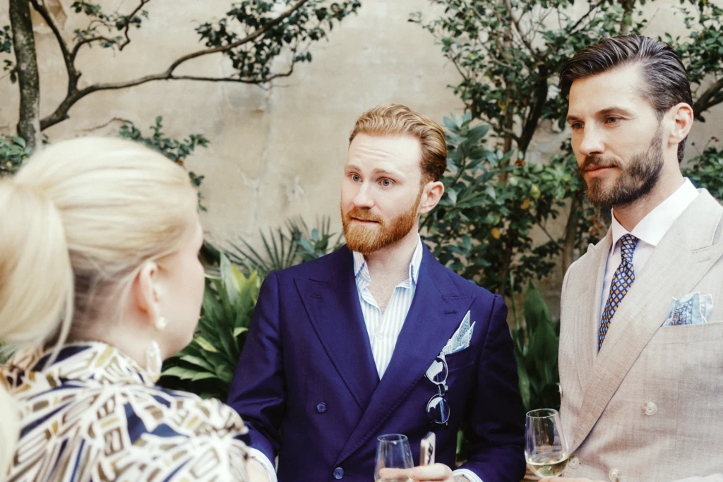 Guests at the Plaza Uomo summer party in the garden of Palazzo Budini Gattai, Florence.