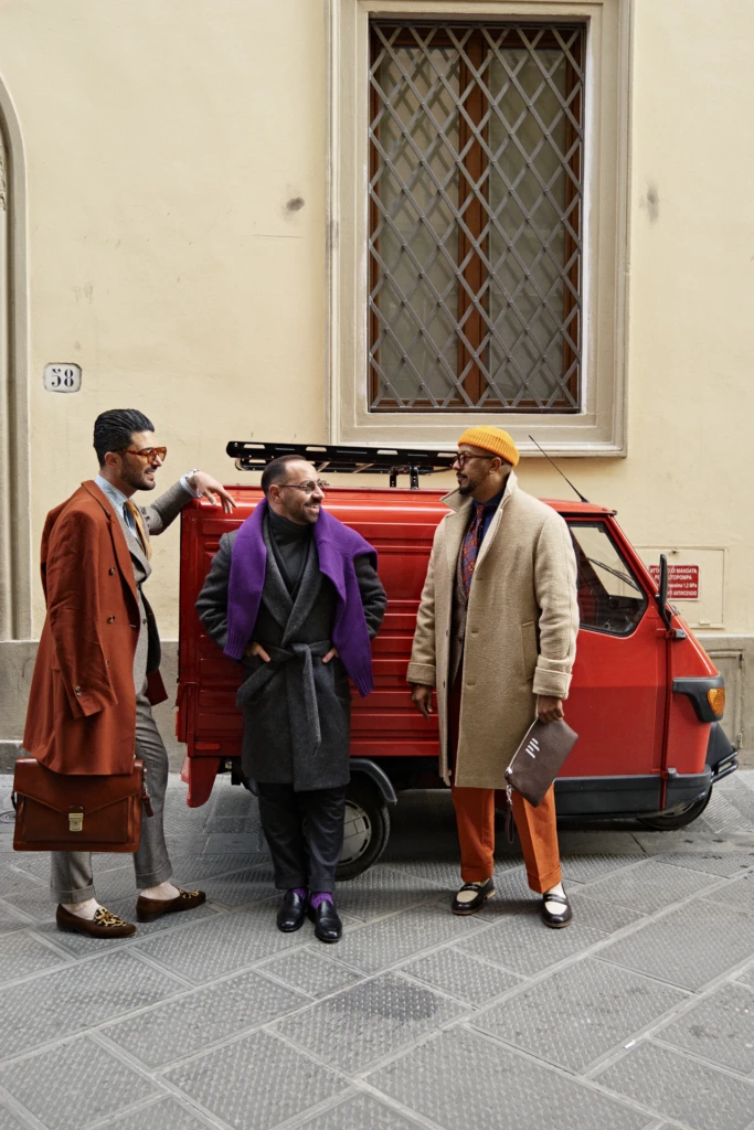 Neto, Pedro and Carlos menswear editorial in the streets of Florence during Pitti Immagine Uomo 107 — commissioned photography by Alessandro Michelazzi, look 109.