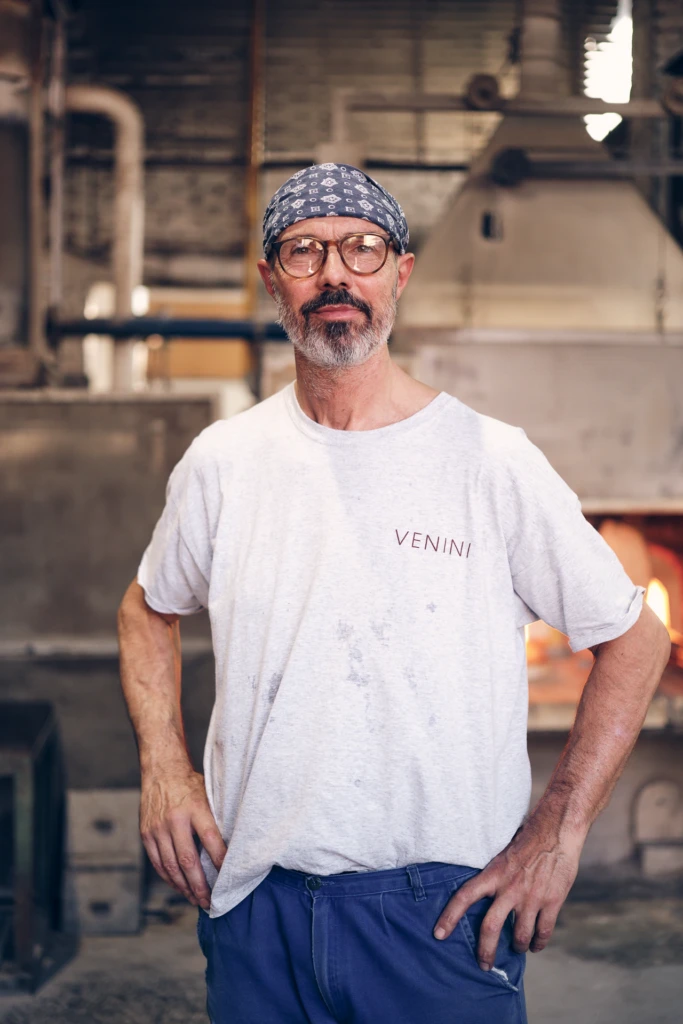 Venini glassblower at the furnace in Murano, Venice