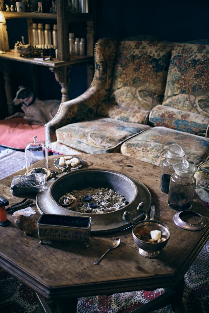 Dark-toned interior of Sileno Cheloni perfume workshop in Florence