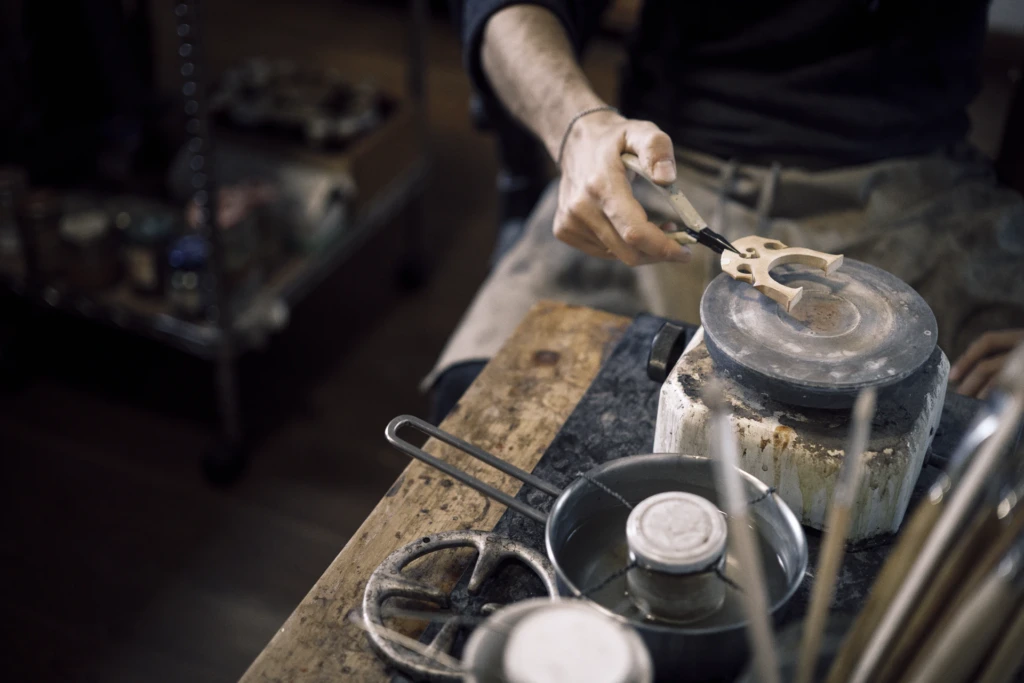 Carving tools and wood shavings on a luthier bench, Florence