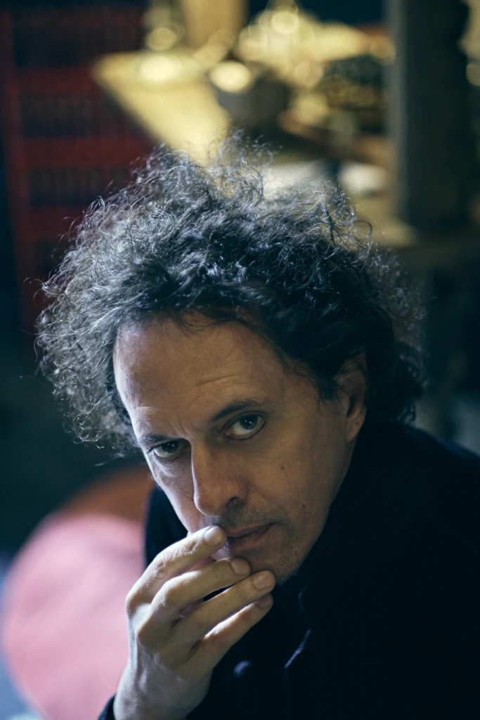 Sileno Cheloni portrait lit by warm light in Florence atelier