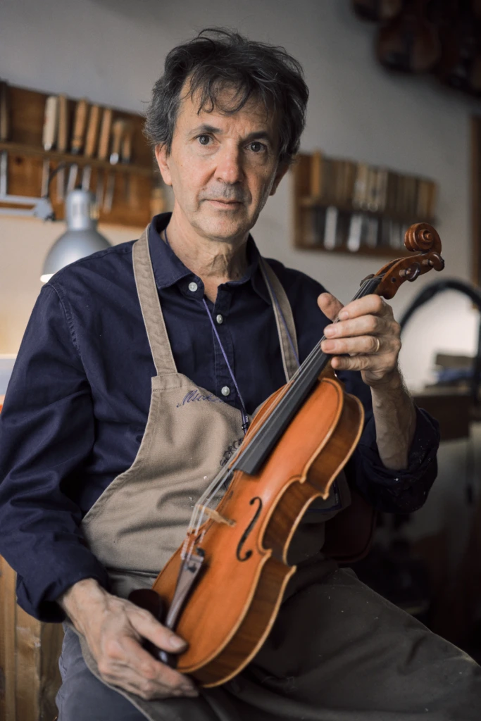 Final portrait of the luthier in his Florence violin workshop