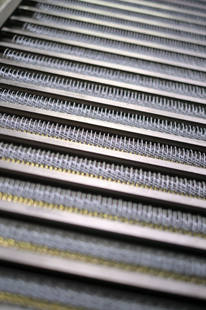 Detail shot of bottles moving through the winery's bottling machinery