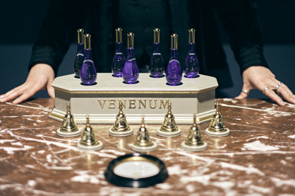 Perfumer at work among glass vials in Florence editorial shoot