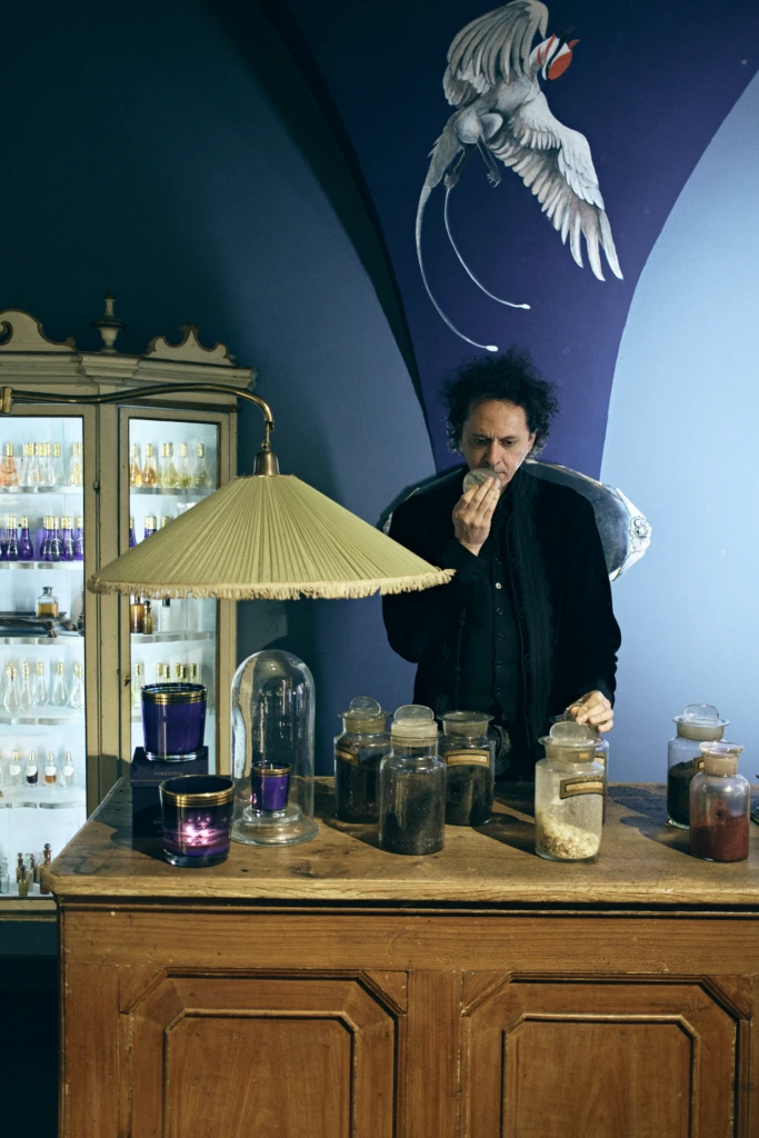 Sileno Cheloni preparing incense for a ritual, Florence workshop