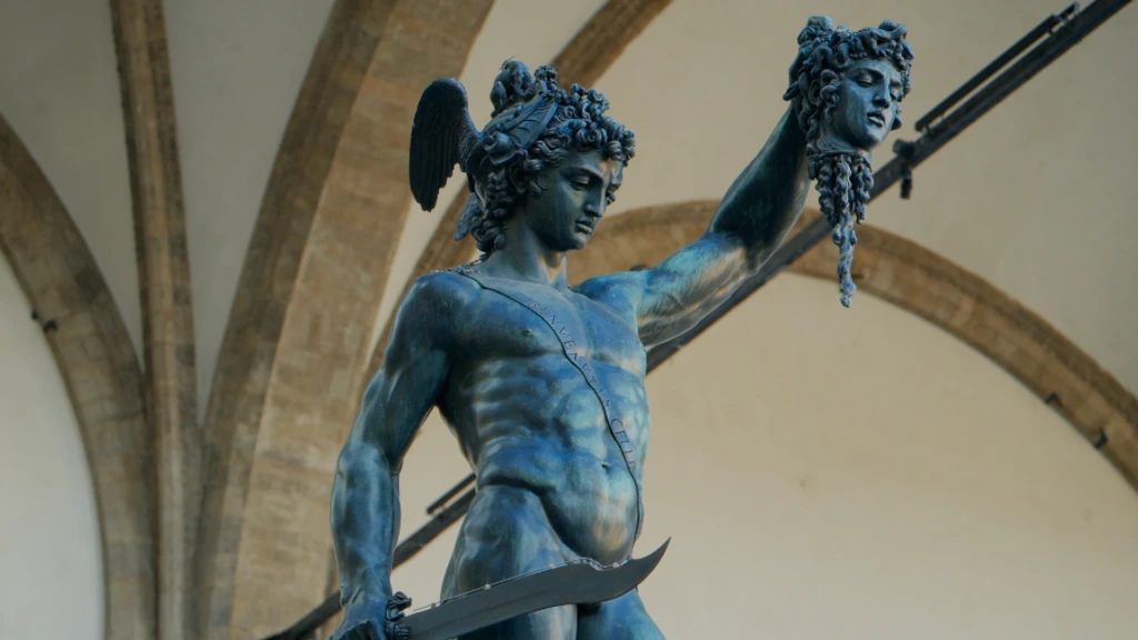 Close-up of the bronze Perseus statue holding Medusa's head in the Loggia dei Lanzi
